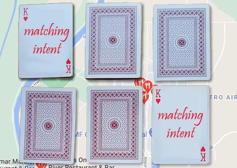 Playing cards on a Google Map background with matching intent written on them