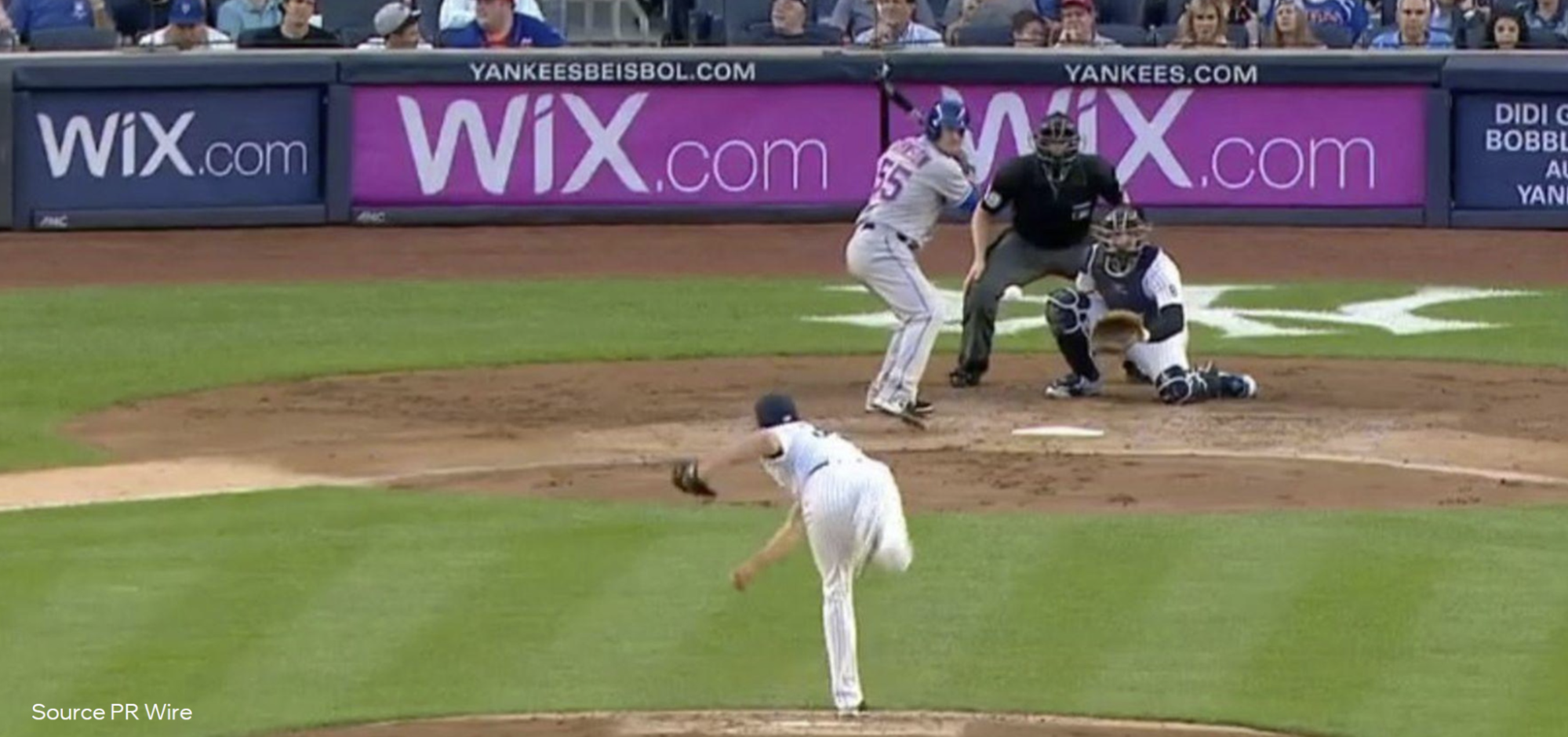 baseball game with wix branded signage