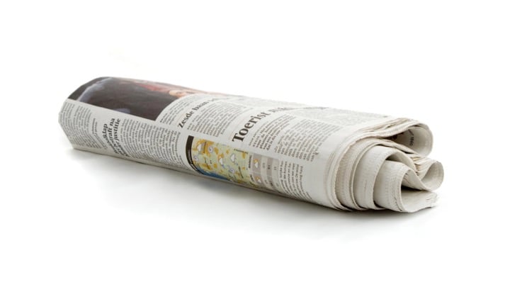 rolled up newspaper